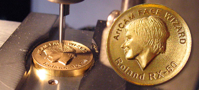 Machining a face onto a coin